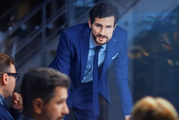 Business leader collaborating with colleagues in a professional meeting