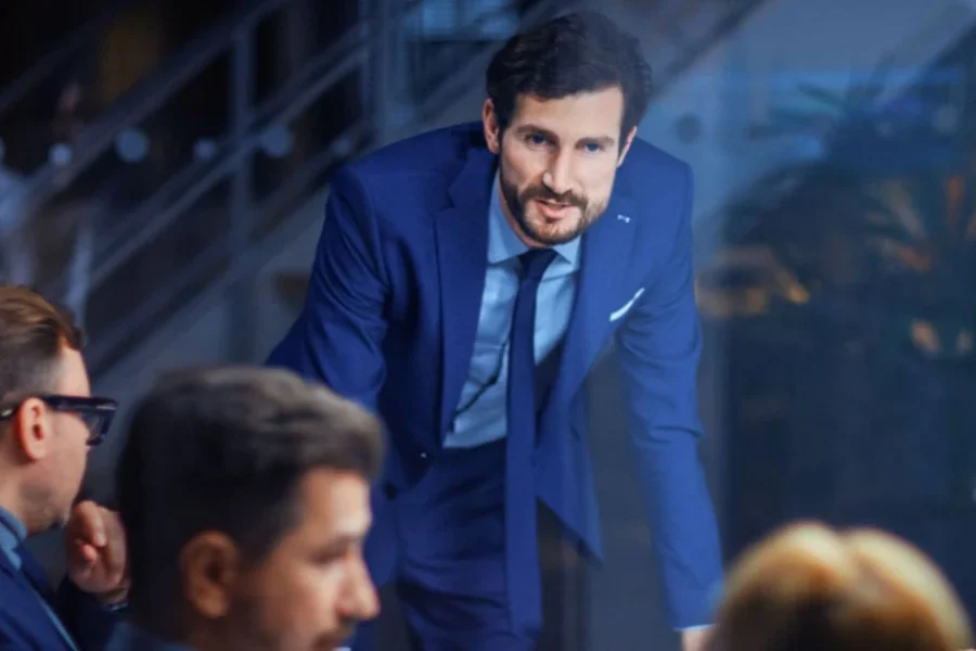 Business leader collaborating with colleagues in a professional meeting